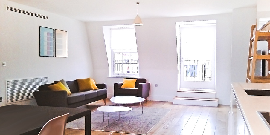 Soft furnishings, hardwood floors & neutral colours gives this converted loft a light, homely feel. 